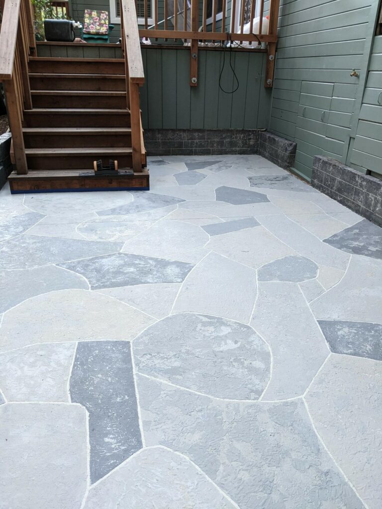 By using mixtures of bone primer and dolphin, ivory and cool grey, DIYr Lisa Young was able to get the variety of realistic colors she wanted for her backyard patio.