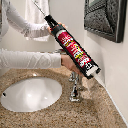 Caulking a bathroom sink